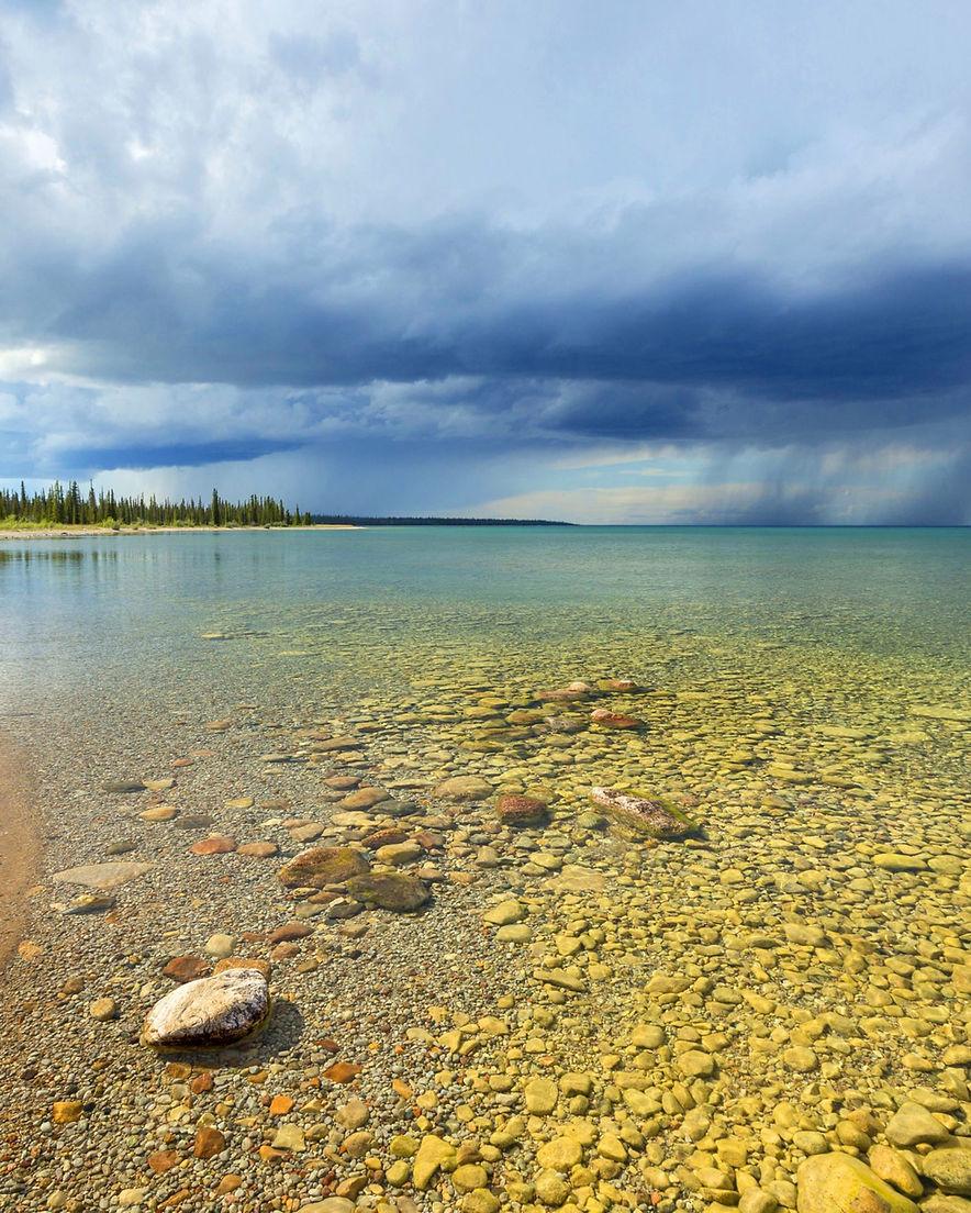 Sahtú region lakeshore — photographed for the Délı̨nę Got'ı̨nę Government community housing program.